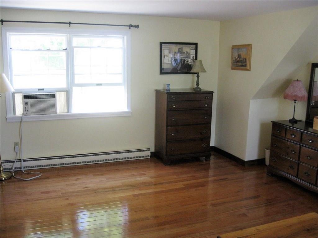 586 Mills Road Whitefield, ME 04353 - Photo 15 of 35 Master Bedroom with wood floor