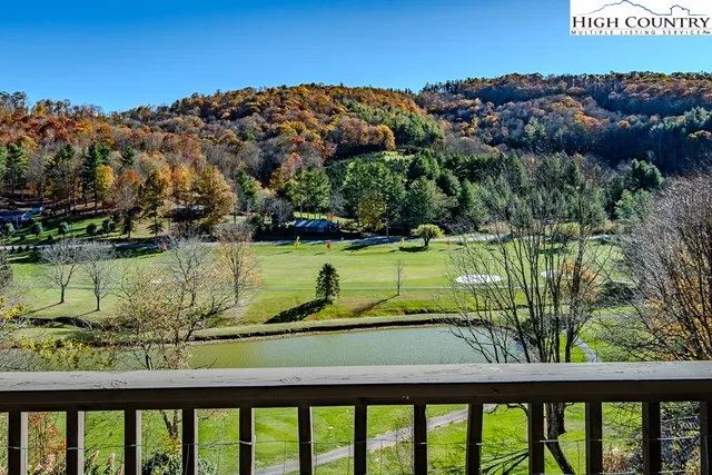 a view of a balcony with lake view