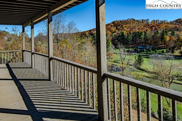 a view of a balcony with an outdoor space