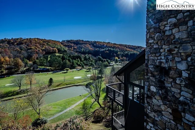 a room with lots of different colored cloths and lots of stuff