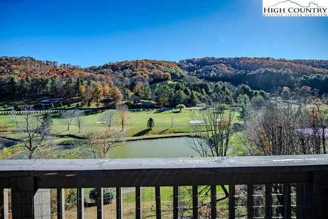 a view of a lake with a mountain in the background