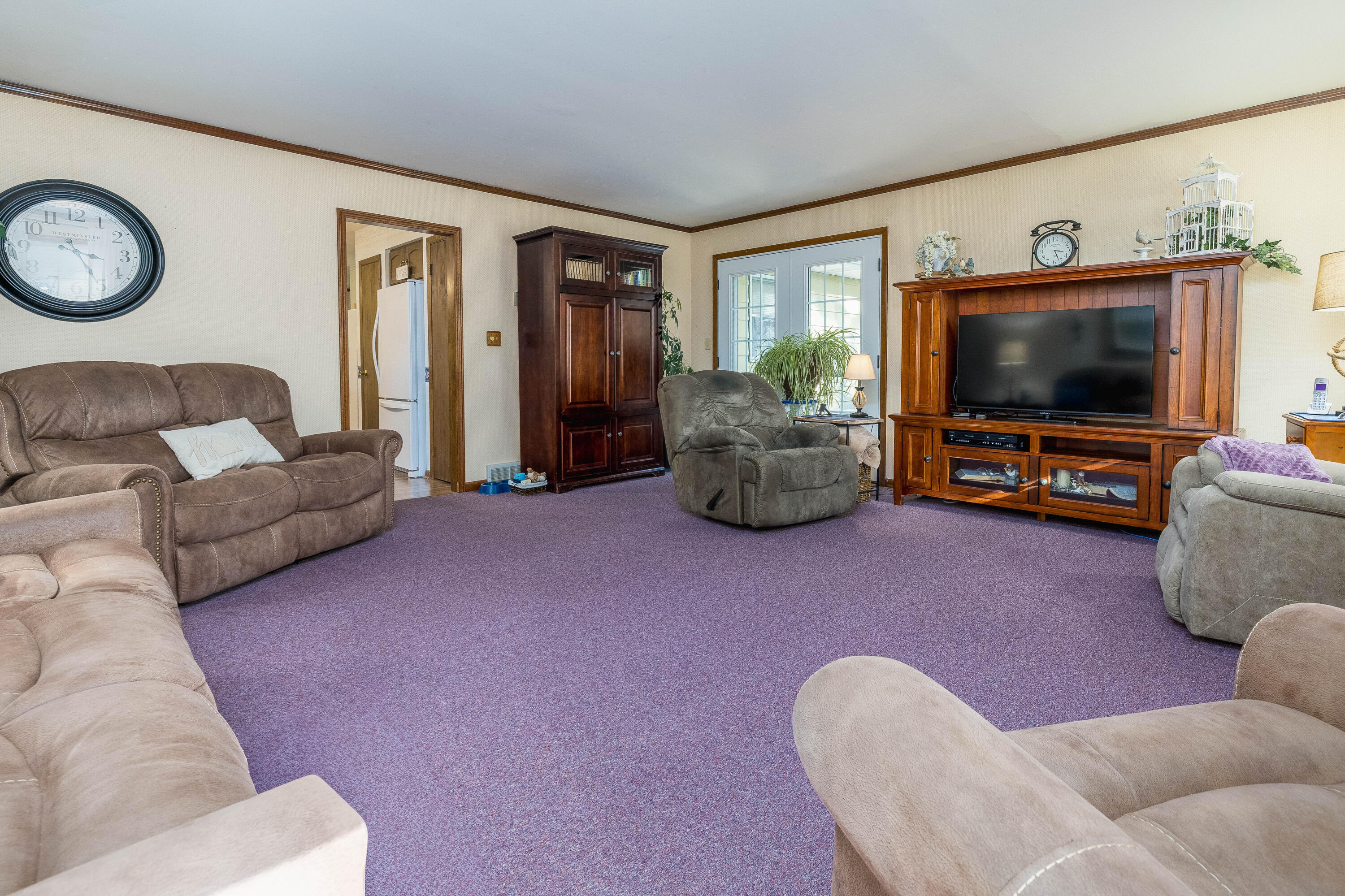 4674 Friar Tuck Circle Rensselaer, IN 47978 - Photo 17 of 47 a living room with furniture and a flat screen tv
