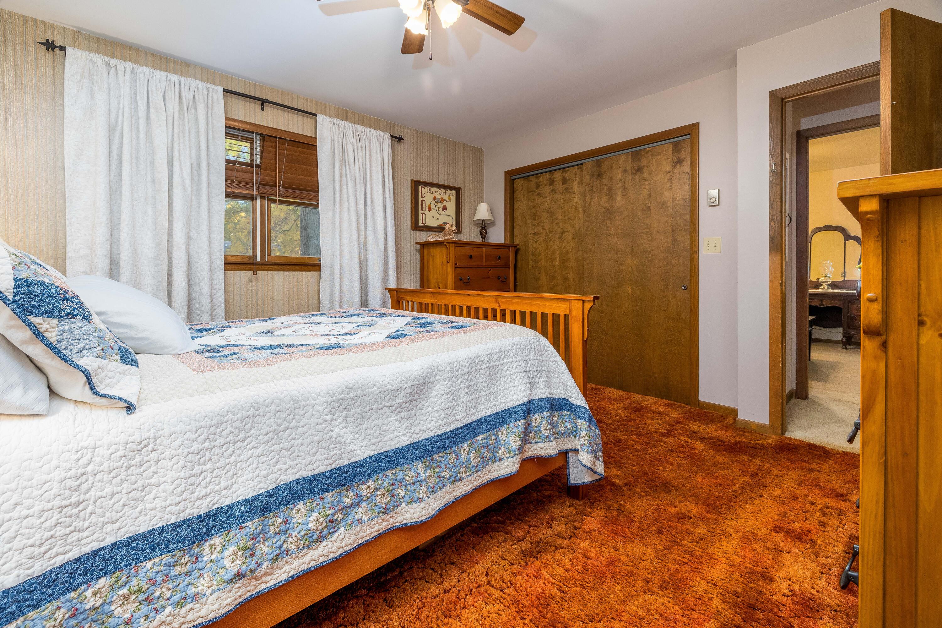 4674 Friar Tuck Circle Rensselaer, IN 47978 - Photo 27 of 47 a bedroom with a bed and a dresser
