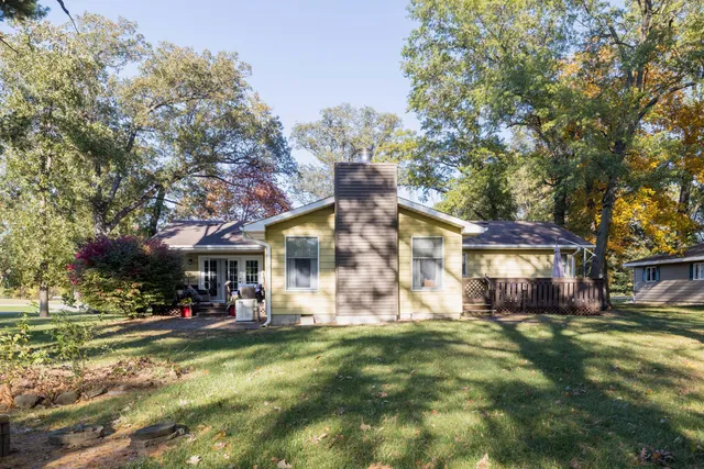 a view of a building with a yard