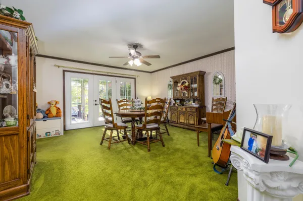 a view of a livingroom with furniture and a livingroom
