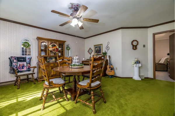 a view of a dining room with furniture