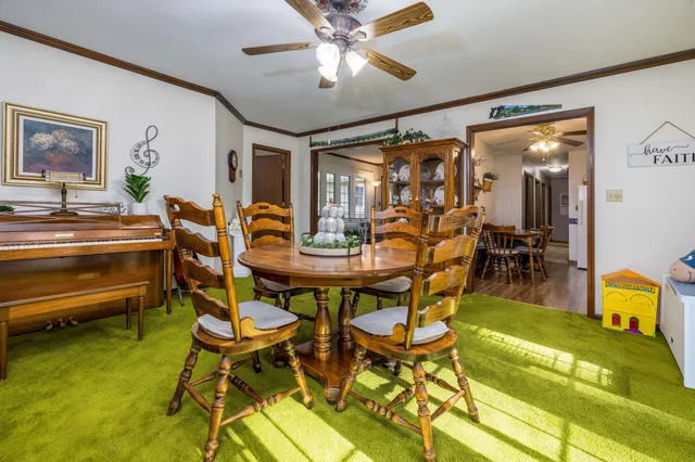 a view of a dining room with furniture