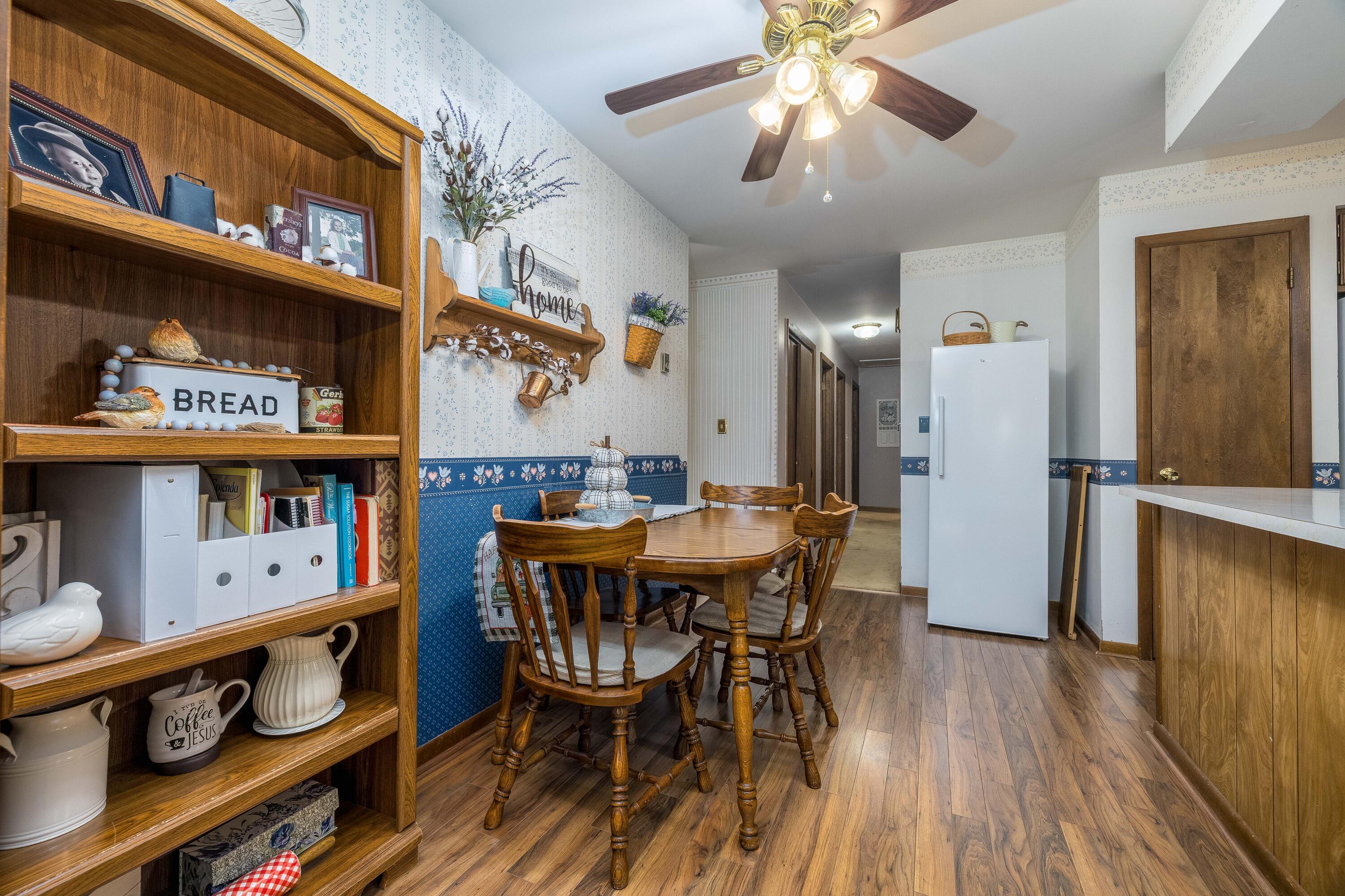 4674 Friar Tuck Circle Rensselaer, IN 47978 - Photo 10 of 47 a dining area with furniture and wooden floor