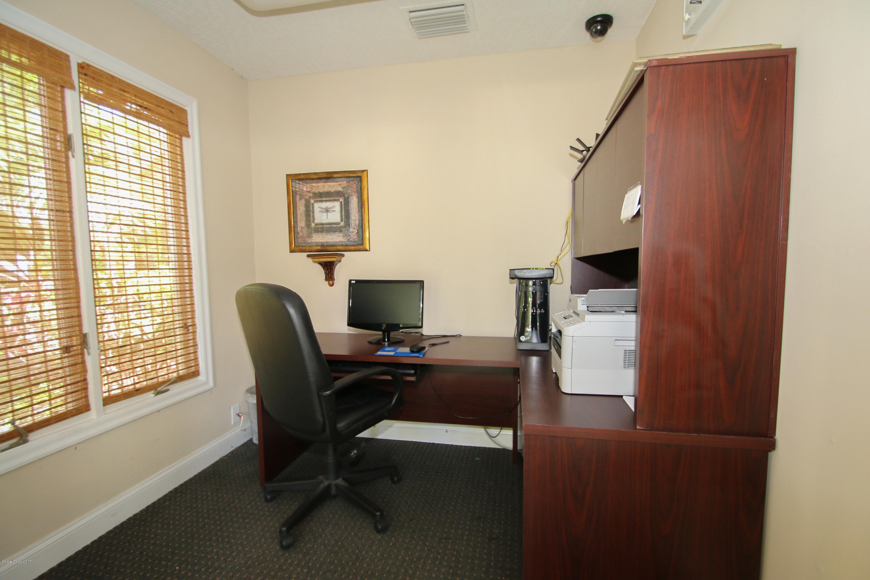 7667 North Wickham Road, Unit 705 Melbourne, FL 32940 - Photo 14 of 17 Business Center