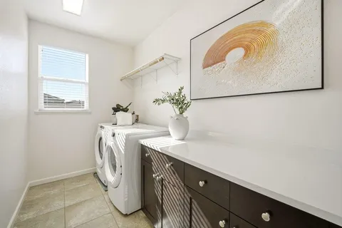 a utility room with a washer and dryer