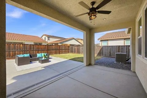 a view of front door and porch with wooden floor