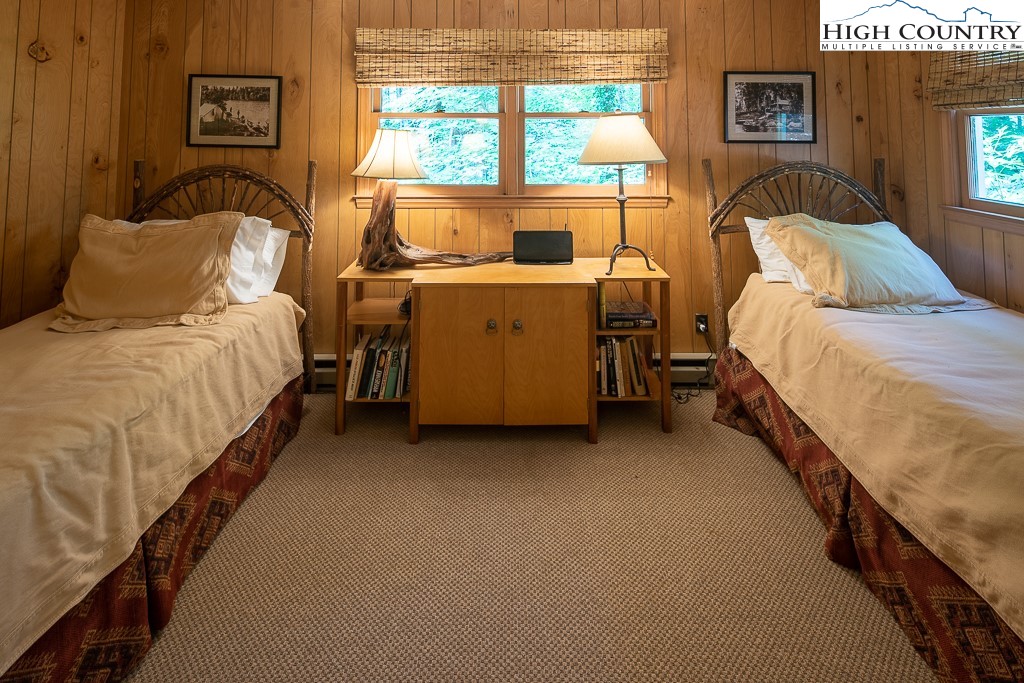 356 Balsam Road Boone, NC 28607 - Photo 24 of 37 a bedroom with bed and window