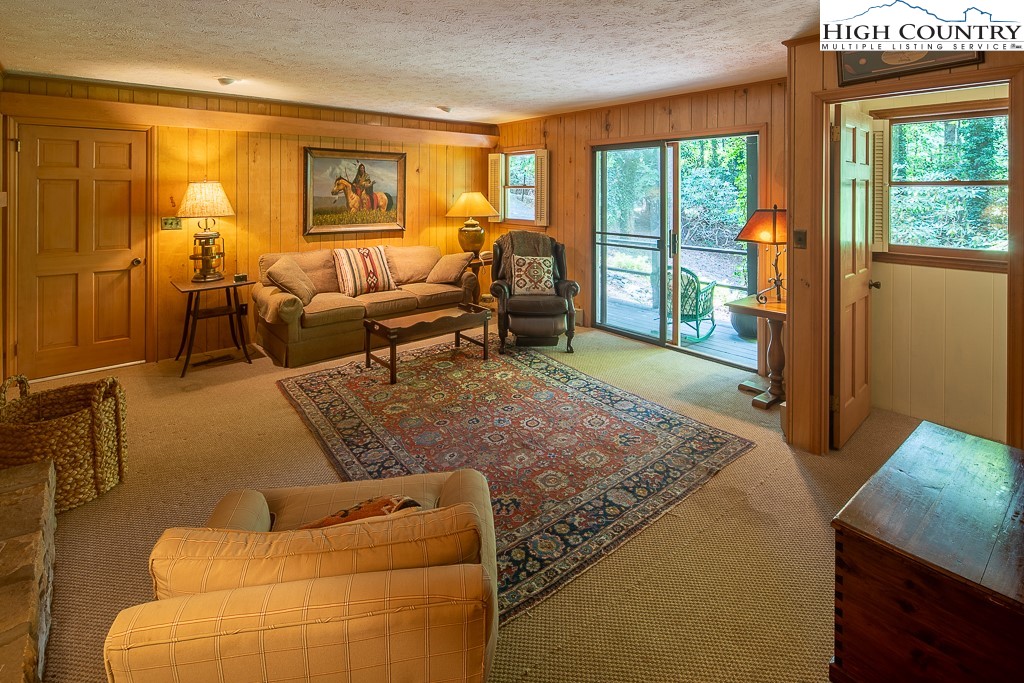 356 Balsam Road Boone, NC 28607 - Photo 25 of 37 a living room with furniture and a window