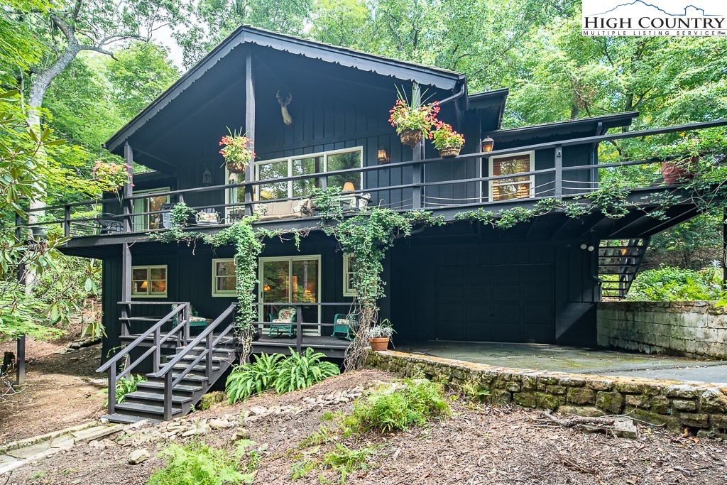 356 Balsam Road Boone, NC 28607 - Photo 34 of 37 a front view of a house with a yard