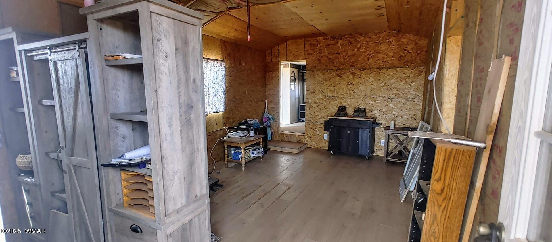 3219 El Capitan Road Show Low, AZ 85901 - Photo 5 of 13 a view of living room with furniture and a wooden floor