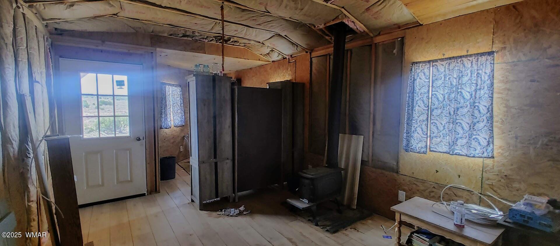 3219 El Capitan Road Show Low, AZ 85901 - Photo 6 of 13 a view of a room with wooden floor and windows