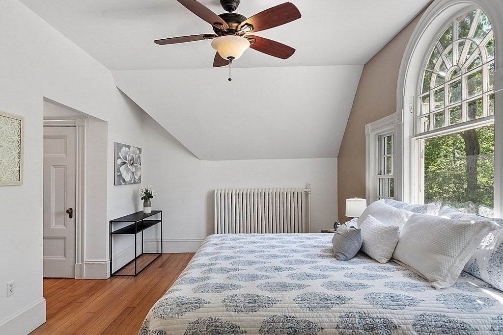 2 Gardner Road, Unit 3 Brookline, MA 02445 - Photo 16 of 32 a bedroom with a bed and a window