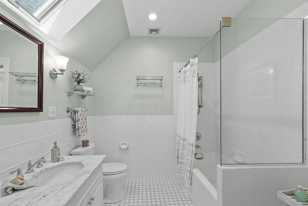 2 Gardner Road, Unit 3 Brookline, MA 02445 - Photo 18 of 32 a bathroom with a sink a toilet and shower