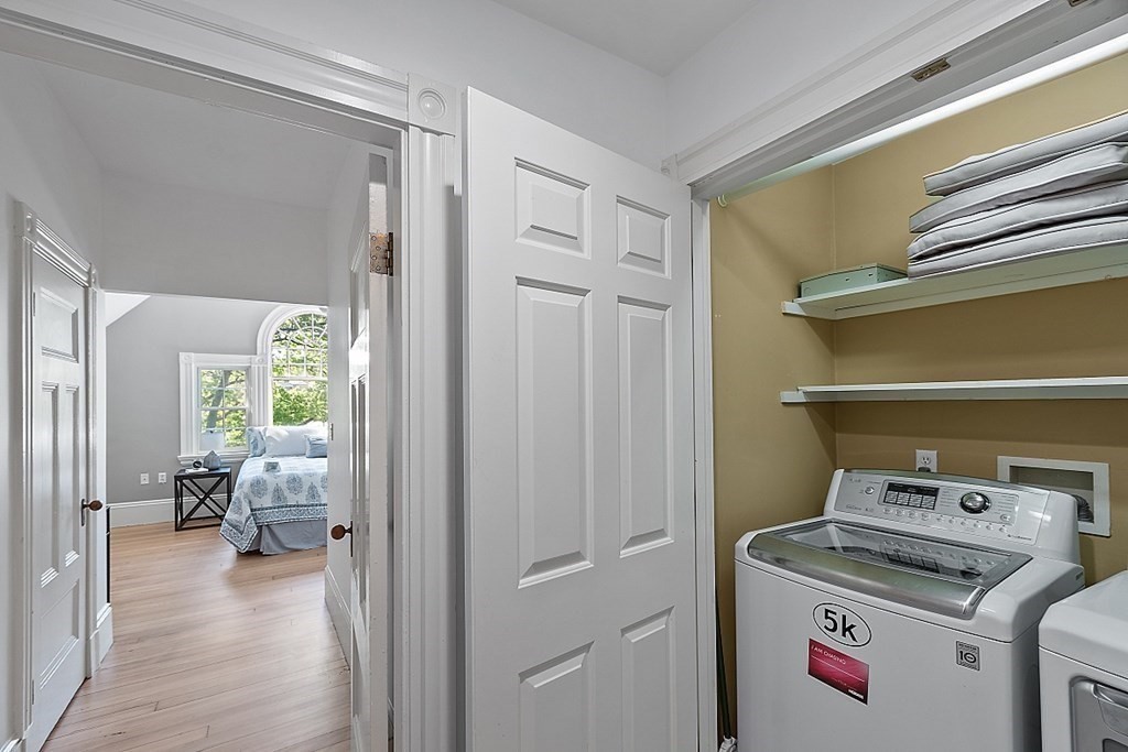 2 Gardner Road, Unit 3 Brookline, MA 02445 - Photo 21 of 32 a utility room with dryer and washer