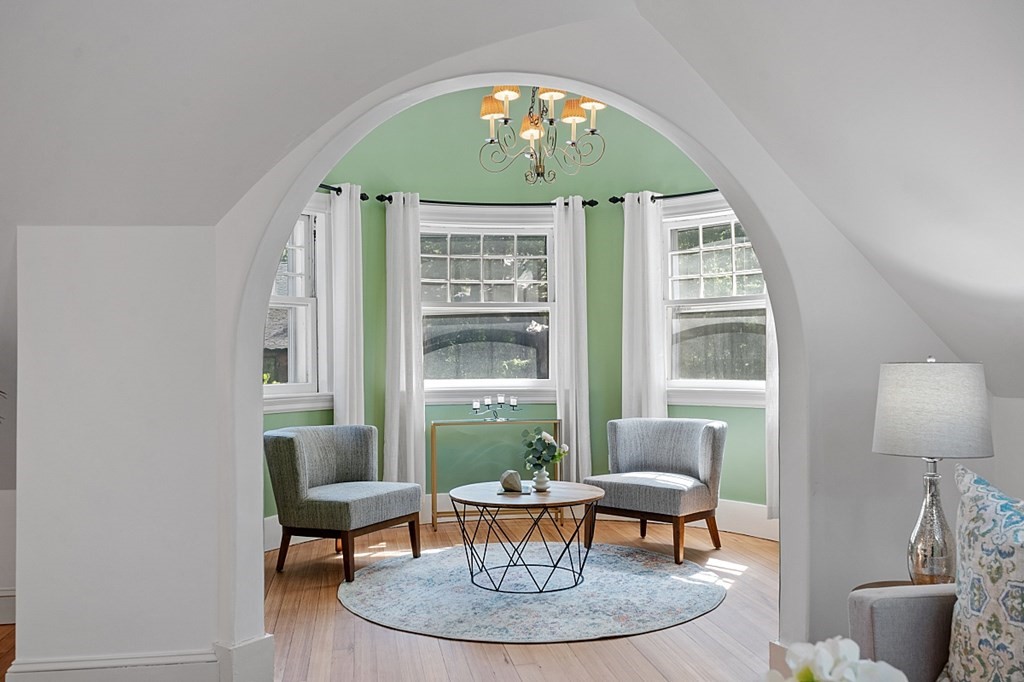 2 Gardner Road, Unit 3 Brookline, MA 02445 - Photo 5 of 32 a living room with furniture and a window