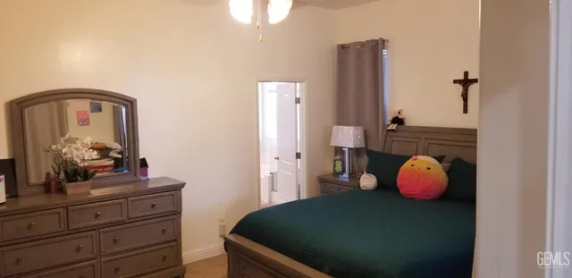 a bathroom with a sink a tub and a mirror