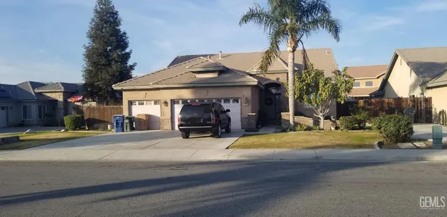 a view of a chairs and tables in patio
