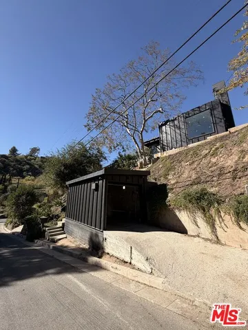 a view of terrace with wooden fence
