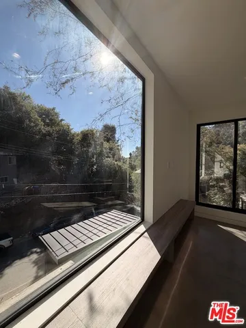 a view of a fireplace in an empty room