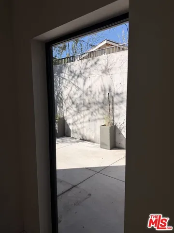 a view of a large window with an outdoor space