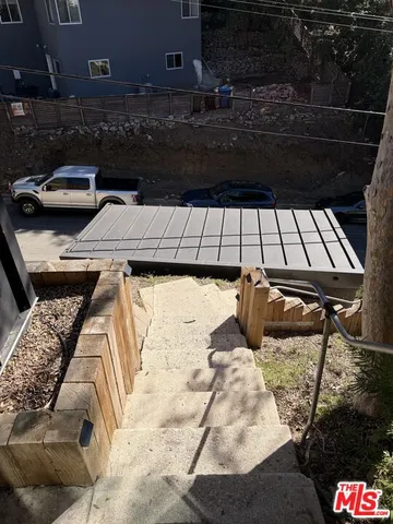 a view of a balcony with chair and the counter top space