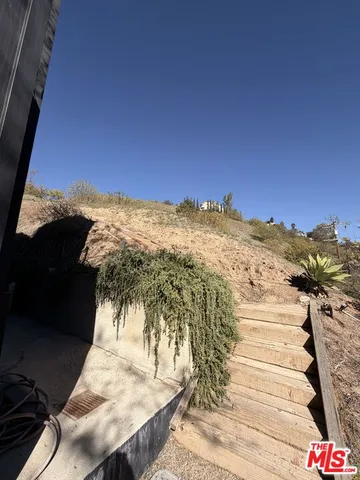 a building with trees in the background