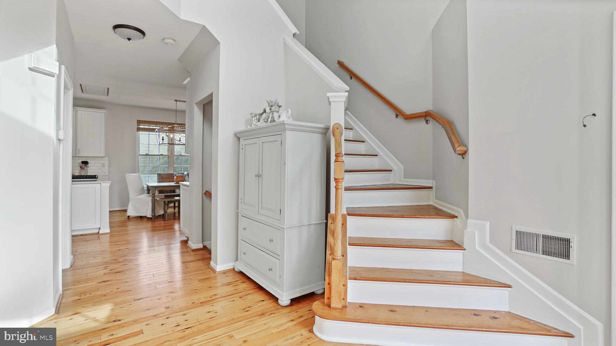 2801 Elsa Court Crofton, MD 21054 - Photo 23 of 58 a view of entryway and hall with wooden floor