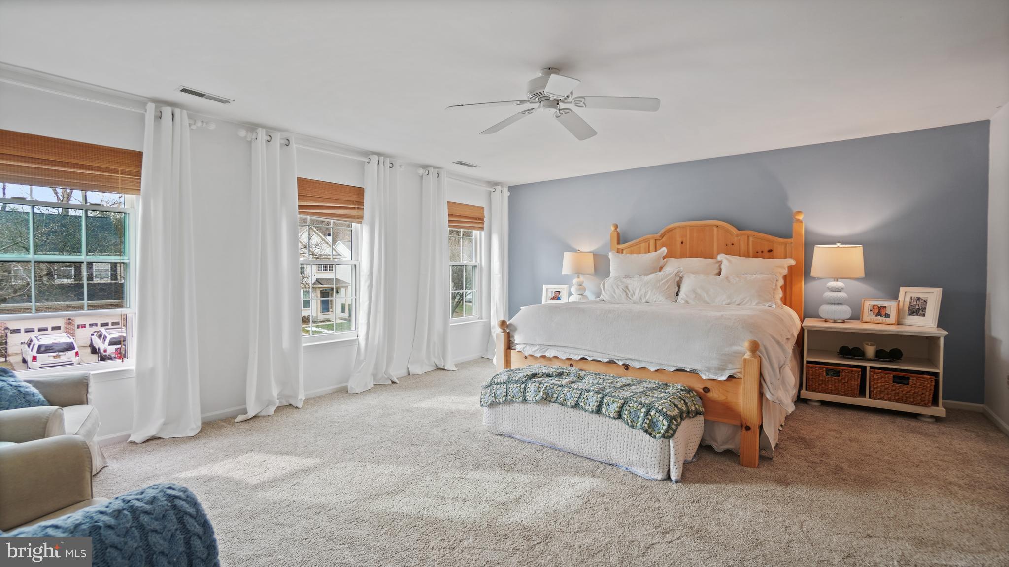 2801 Elsa Court Crofton, MD 21054 - Photo 24 of 58 a bedroom with a bed and a chandelier