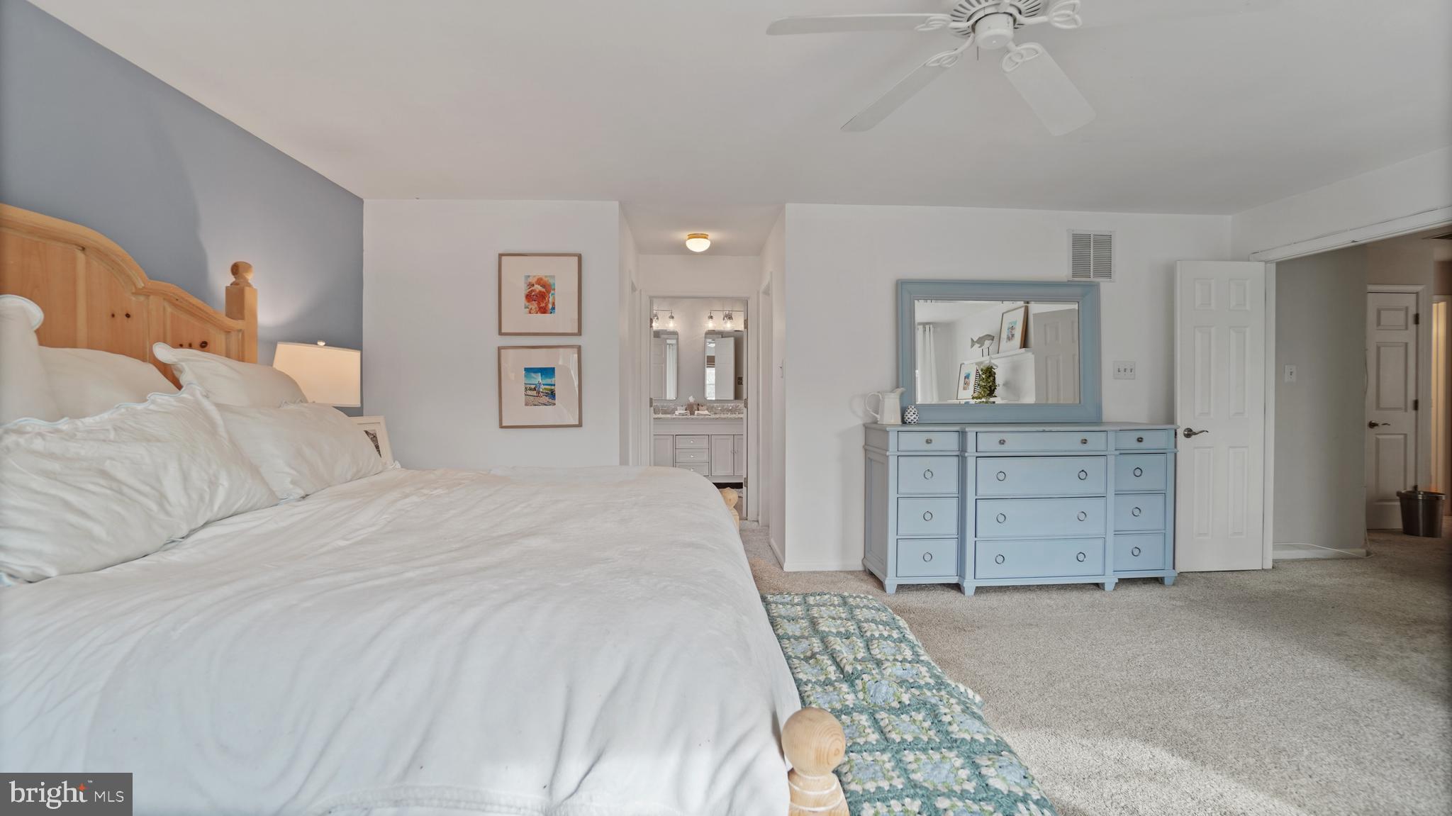 2801 Elsa Court Crofton, MD 21054 - Photo 27 of 58 a bed room with a bed and a dresser