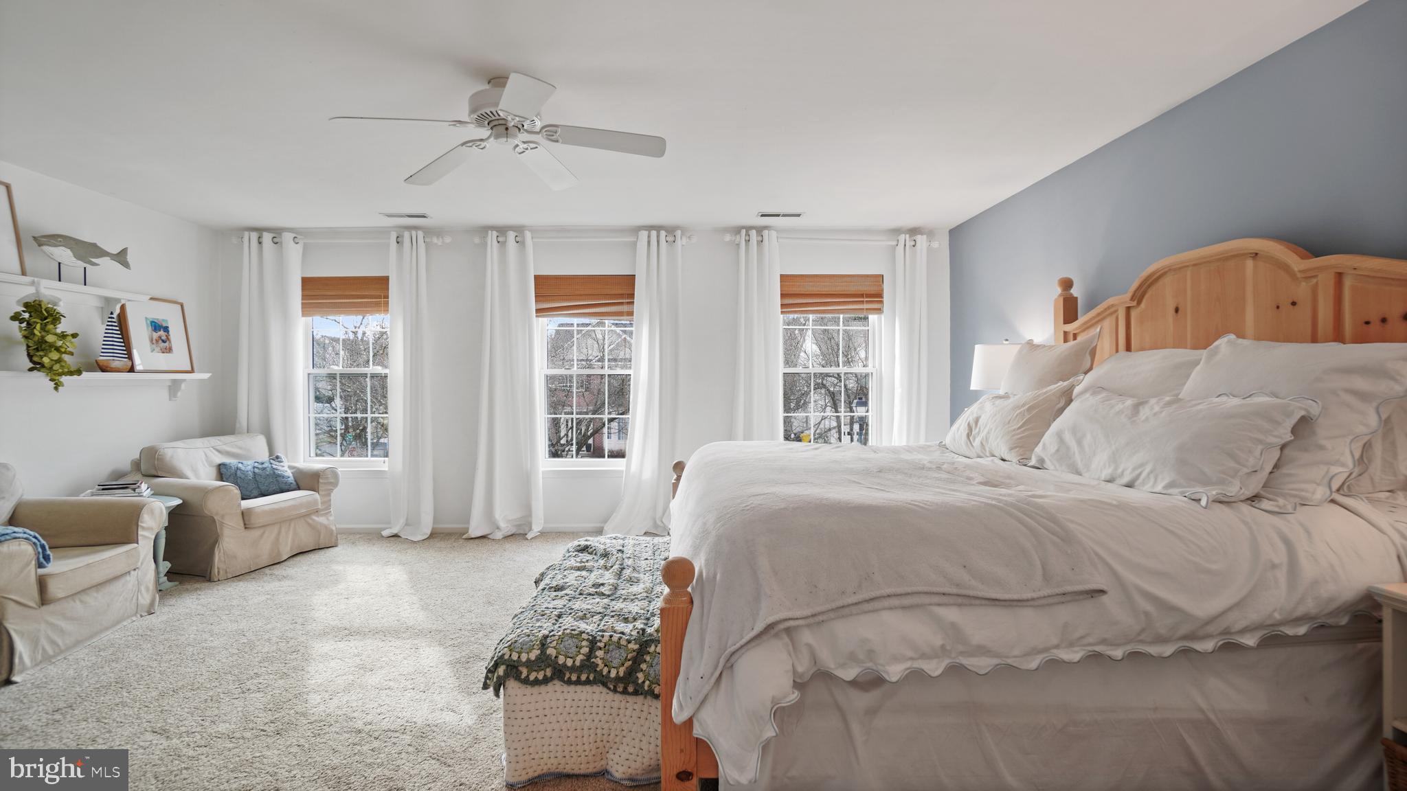 2801 Elsa Court Crofton, MD 21054 - Photo 29 of 58 a bedroom with a bed and windows