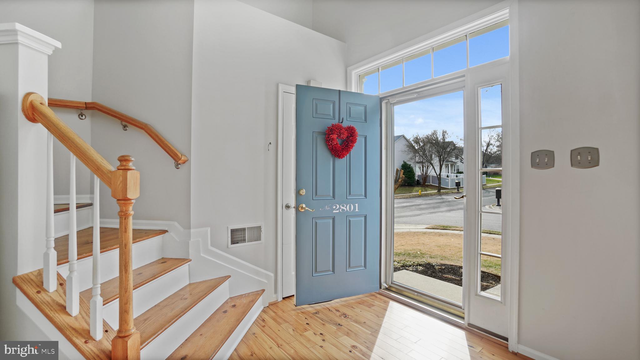 2801 Elsa Court Crofton, MD 21054 - Photo 3 of 58 a spacious bedroom with a bed and a window