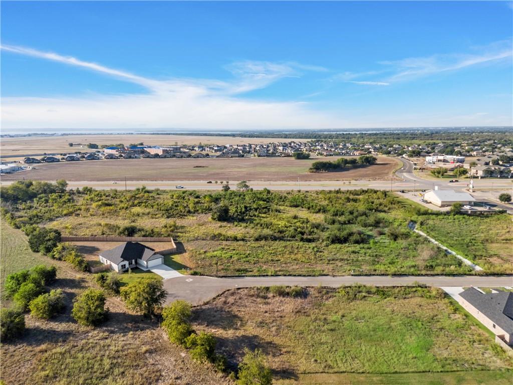 9801 Bridlewood Lane Waco, TX 76708 - Photo 6 of 10 a view of a lake with a mountain