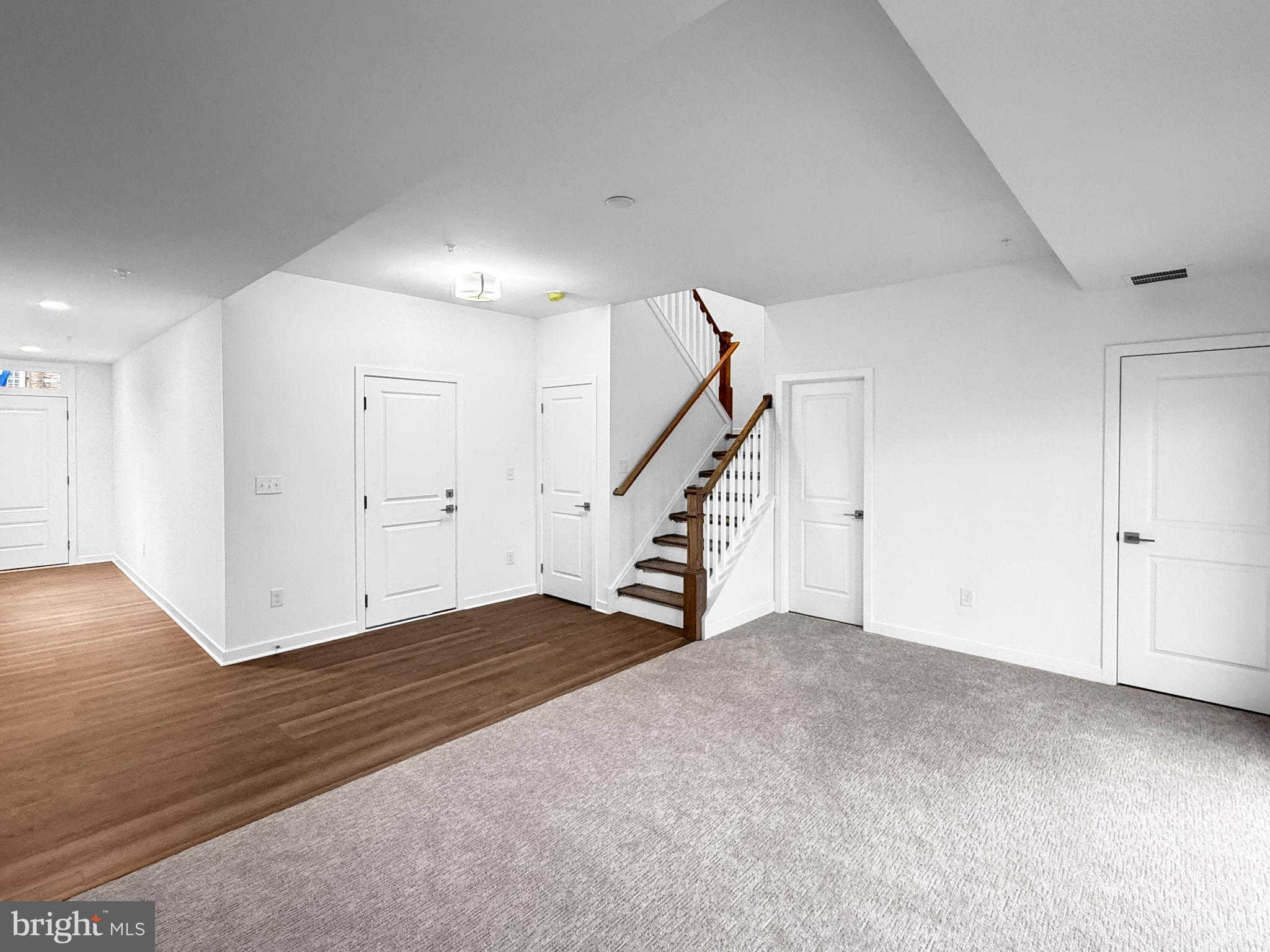 11 West Butler Avenue New Britain, PA 18901 - Photo 7 of 42 a view of an empty room with wooden floor
