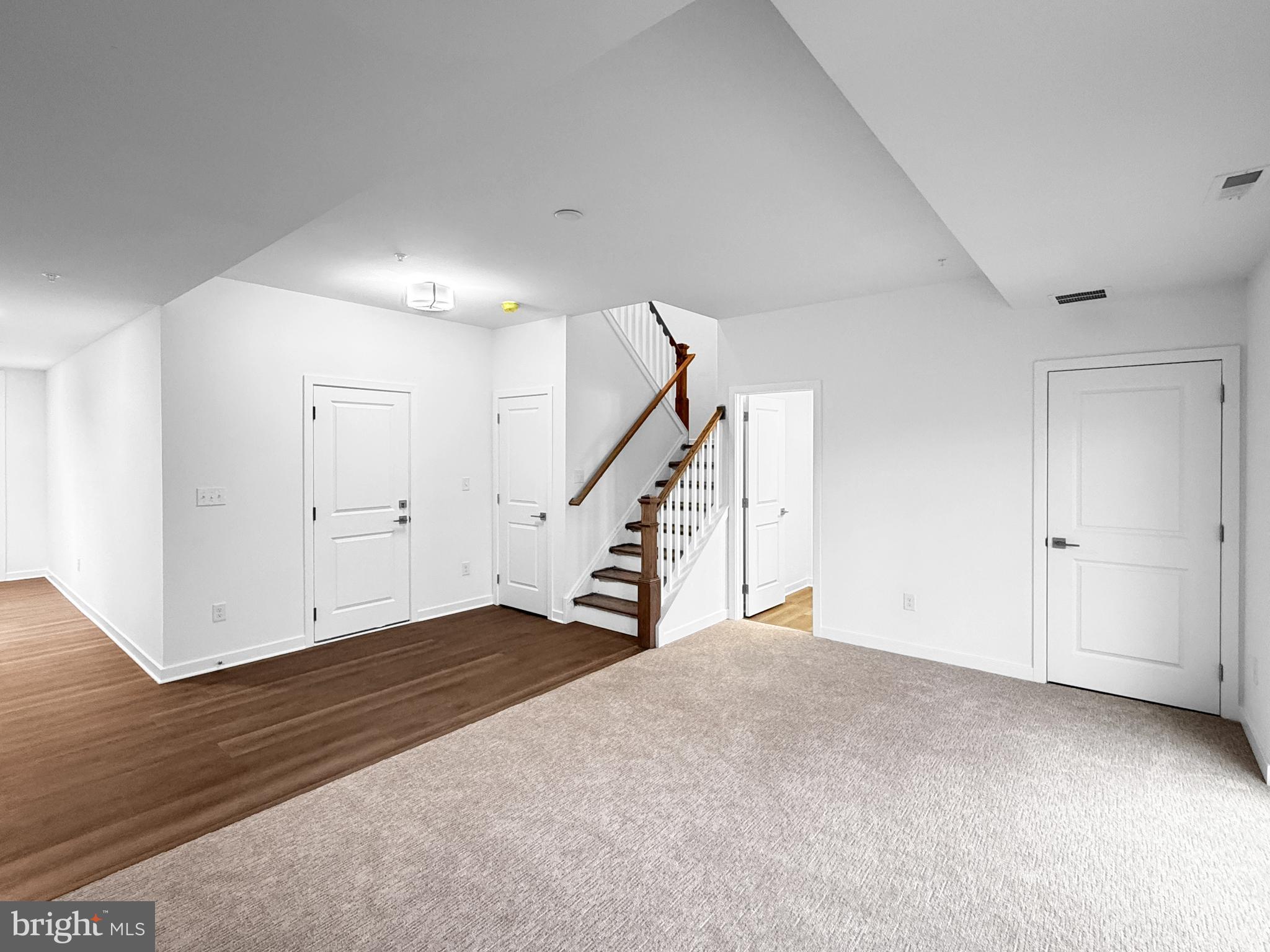 11 West Butler Avenue New Britain, PA 18901 - Photo 8 of 42 a view of an empty room with wooden floor