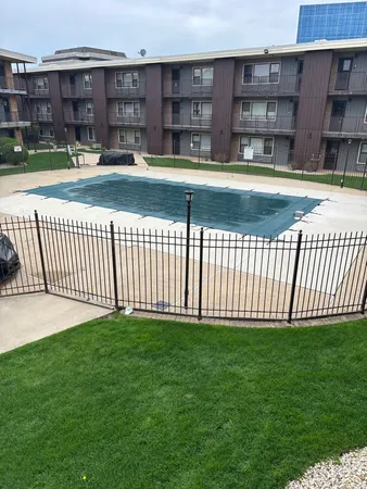 a view of a backyard with a tub