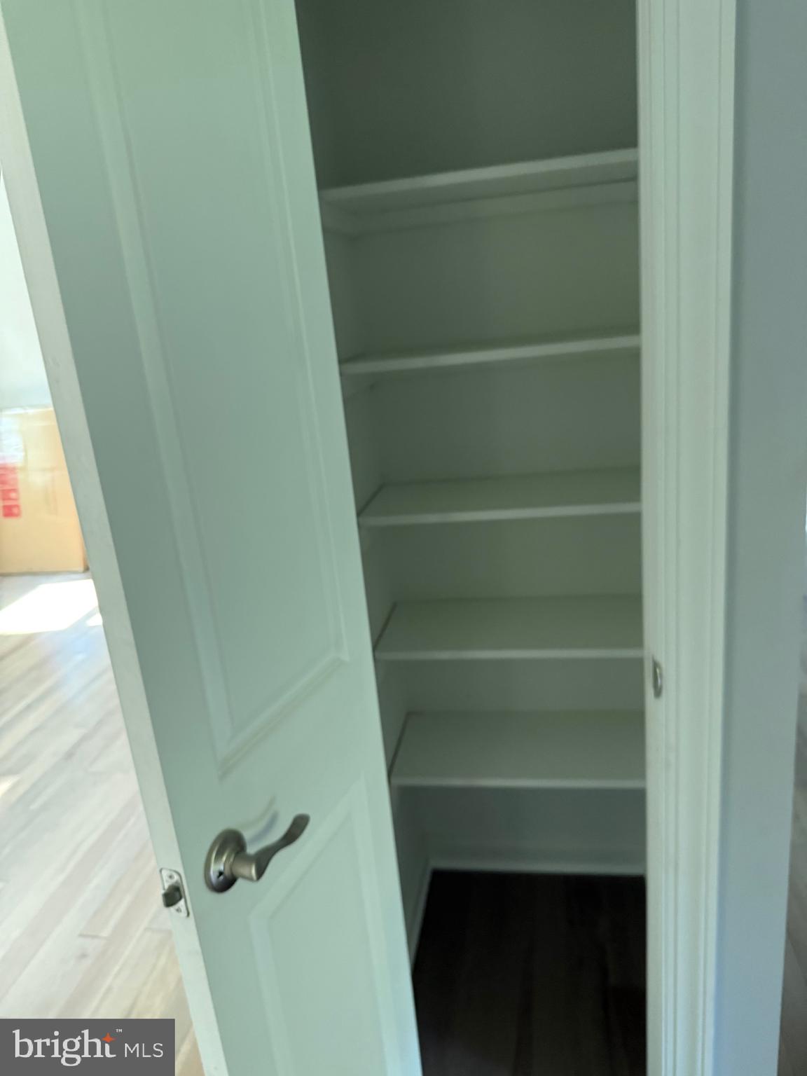 7810 Newington Woods Drive Springfield, VA 22153 - Photo 21 of 50 a view of walk in closet with empty racks