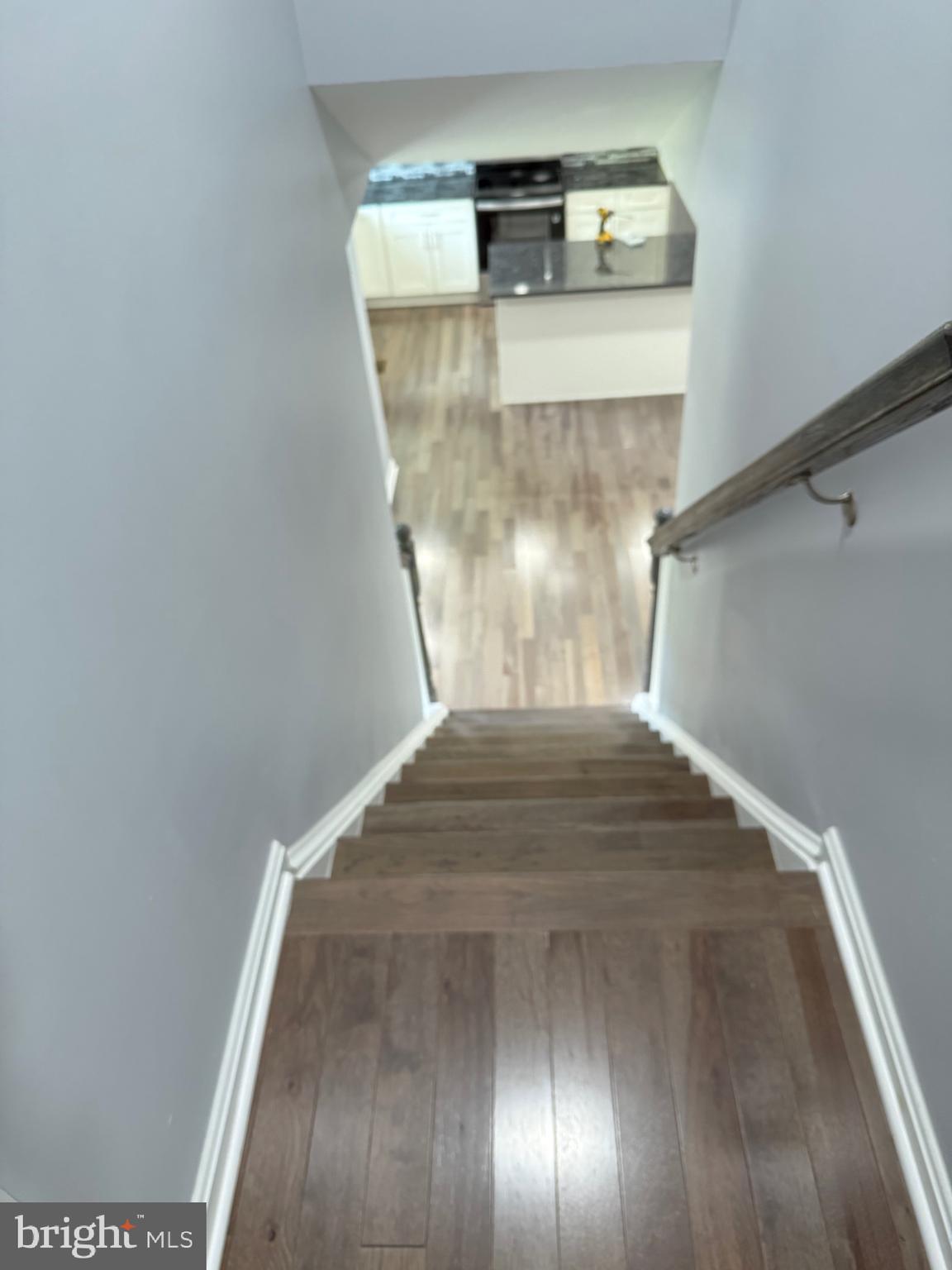 7810 Newington Woods Drive Springfield, VA 22153 - Photo 28 of 50 a view of staircase with kitchen
