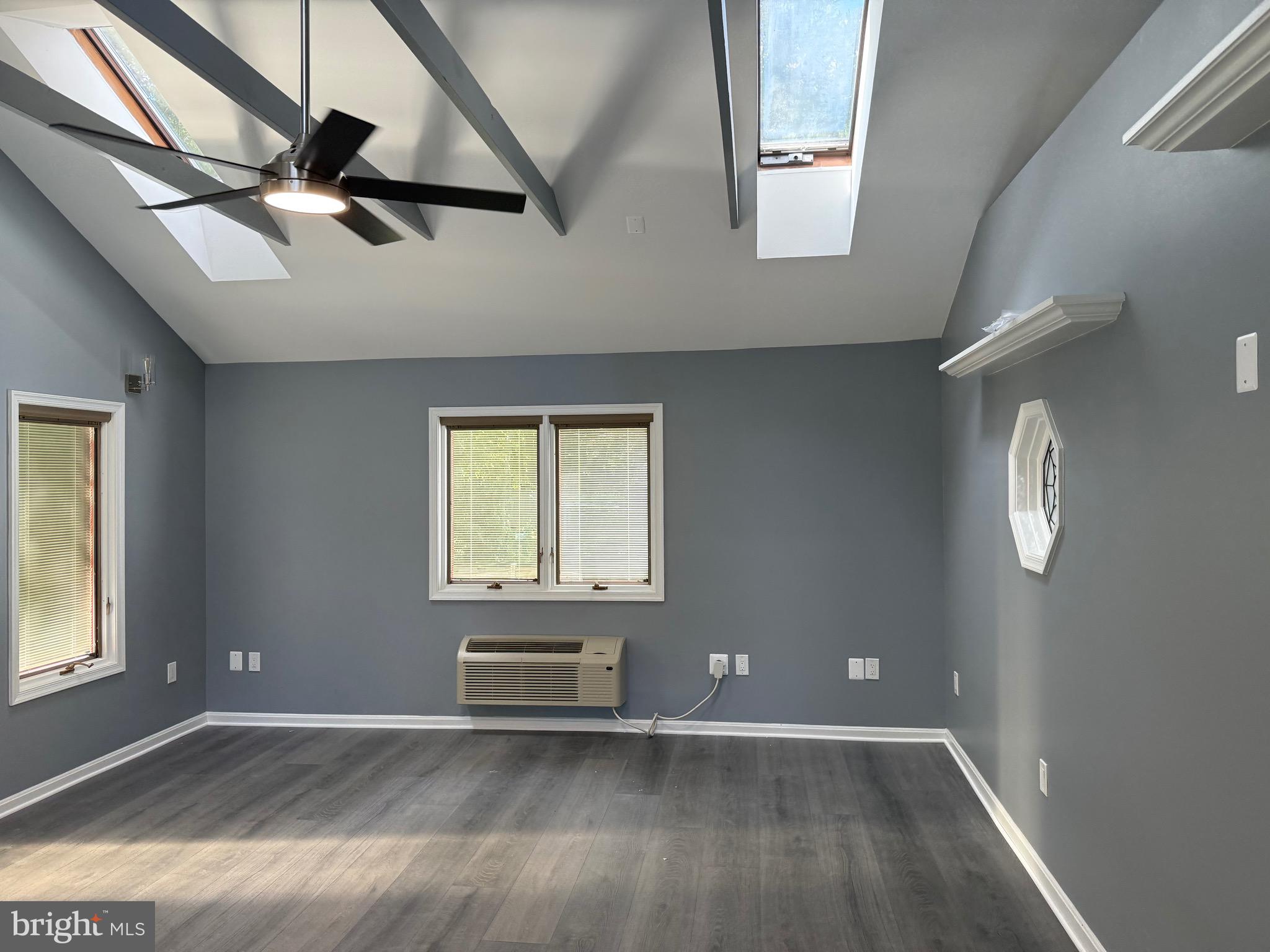7810 Newington Woods Drive Springfield, VA 22153 - Photo 40 of 50 an empty room with windows