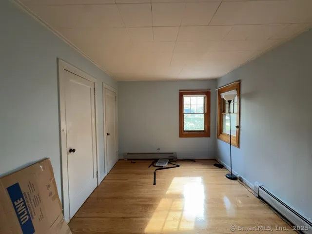 a room with window and stairs