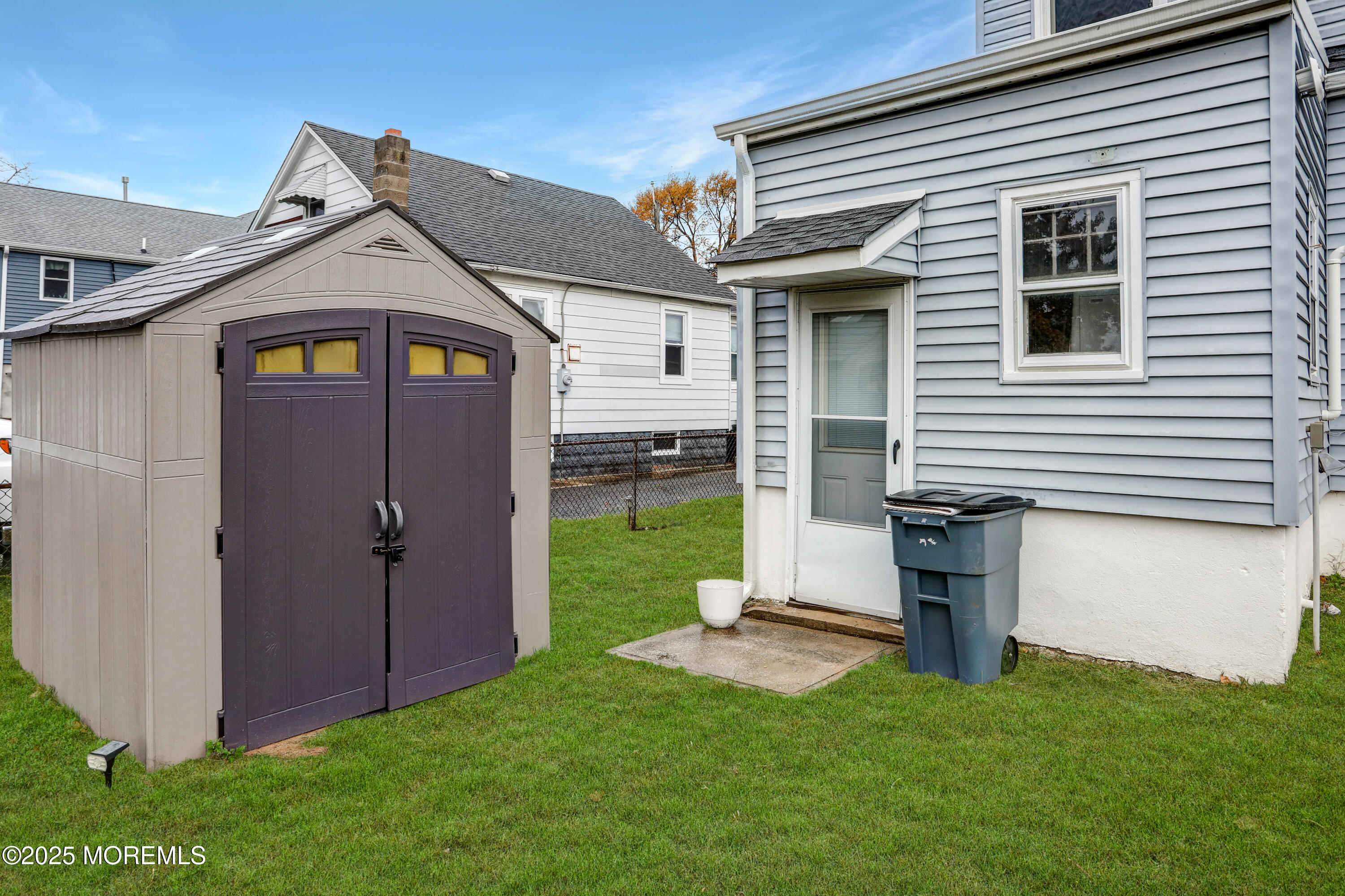 120 Victoria Place Union Beach, NJ 07735 - Photo 18 of 18 a view of a back yard of the house