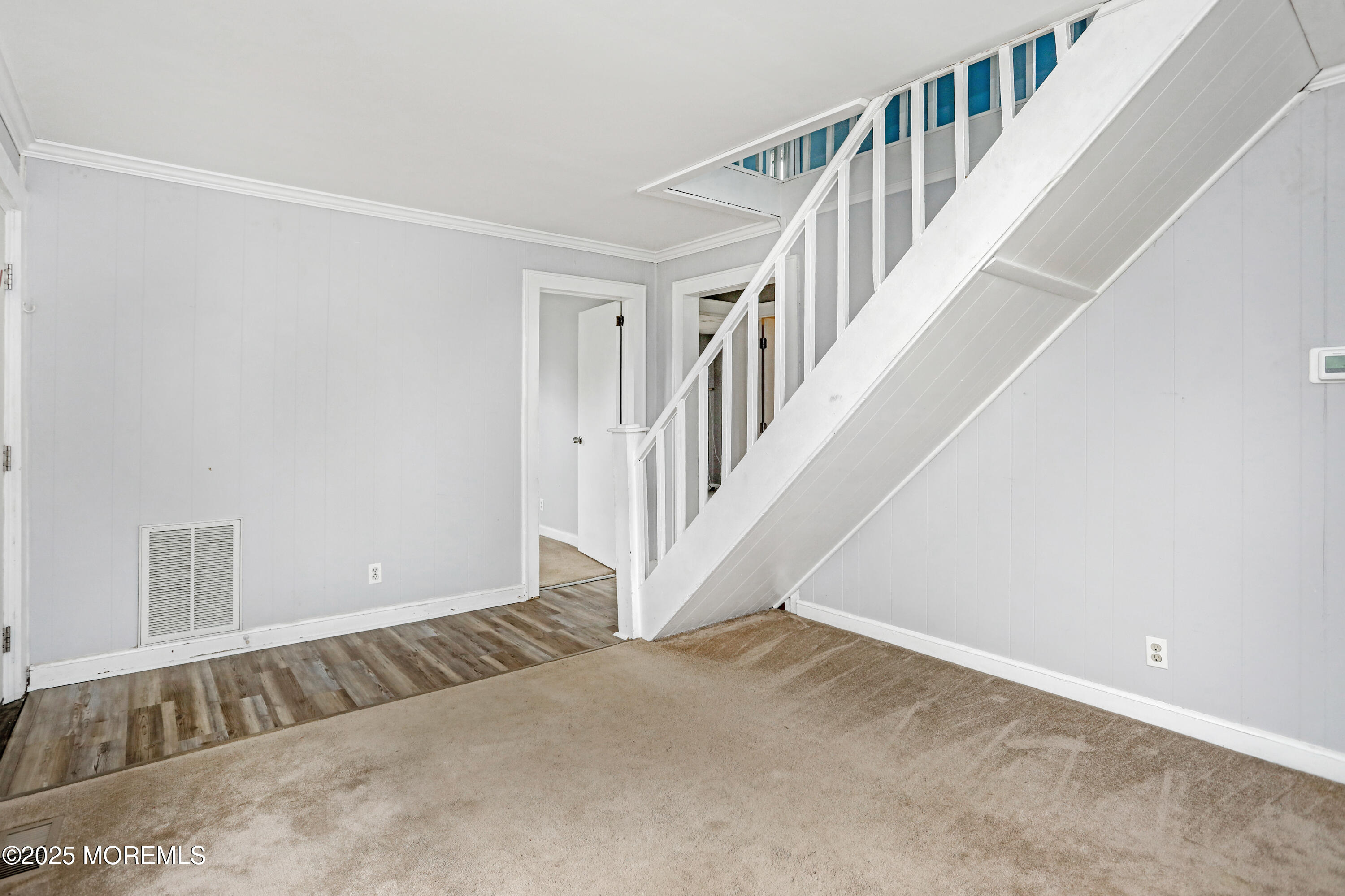 120 Victoria Place Union Beach, NJ 07735 - Photo 3 of 18 a view of an empty room with stairs