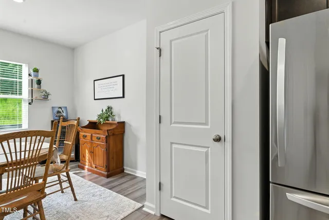 a livingroom with furniture window and wooden floor