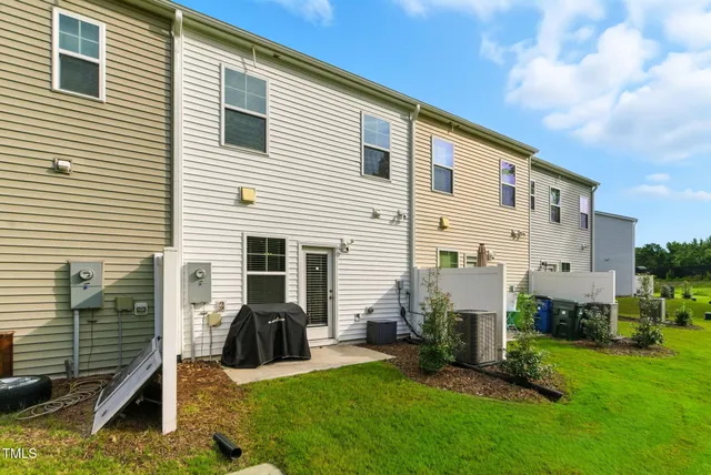 an aerial view of a house with a garden