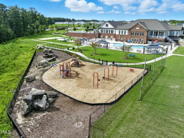 a large white kitchen with lots of counter space