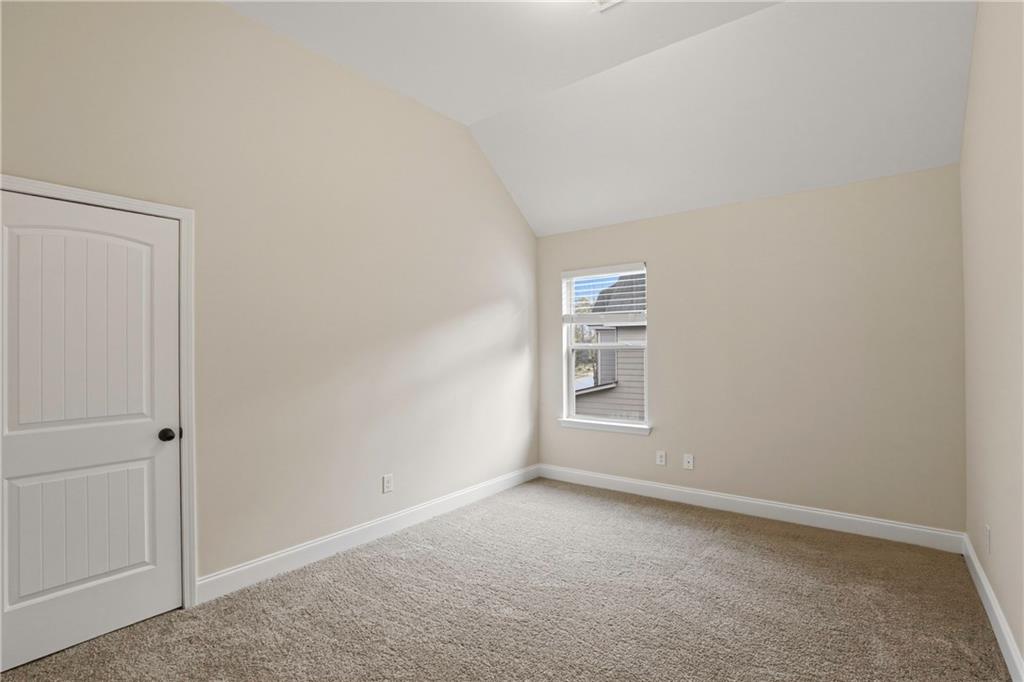 1423 Stone Ridge Court Hampton, GA 30228 - Photo 13 of 22 a view of an empty room and a window